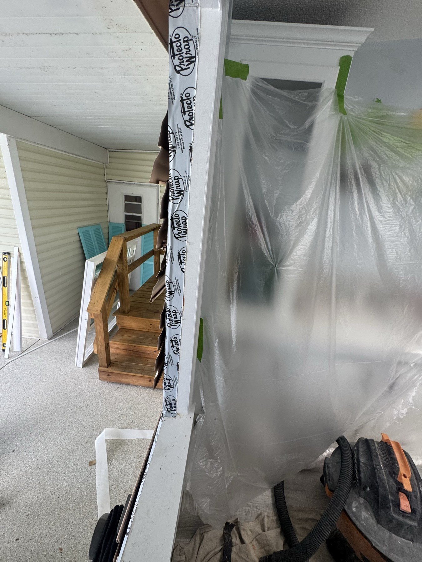 Protecto Wrap tape on window frame — professional seal